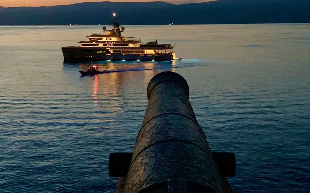 Old Cannon facing a superyacht