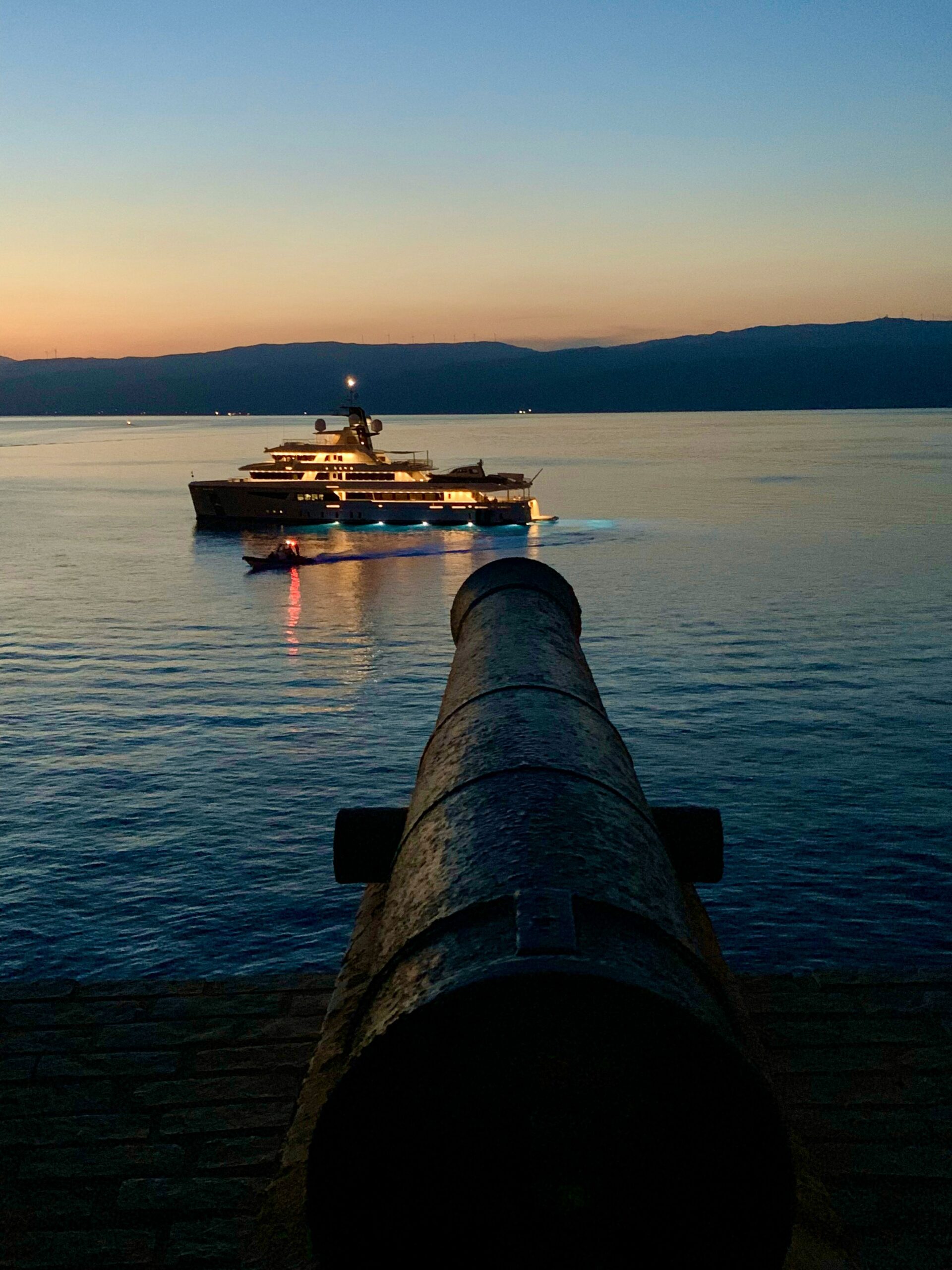 cannon Old Cannon facing a superyacht